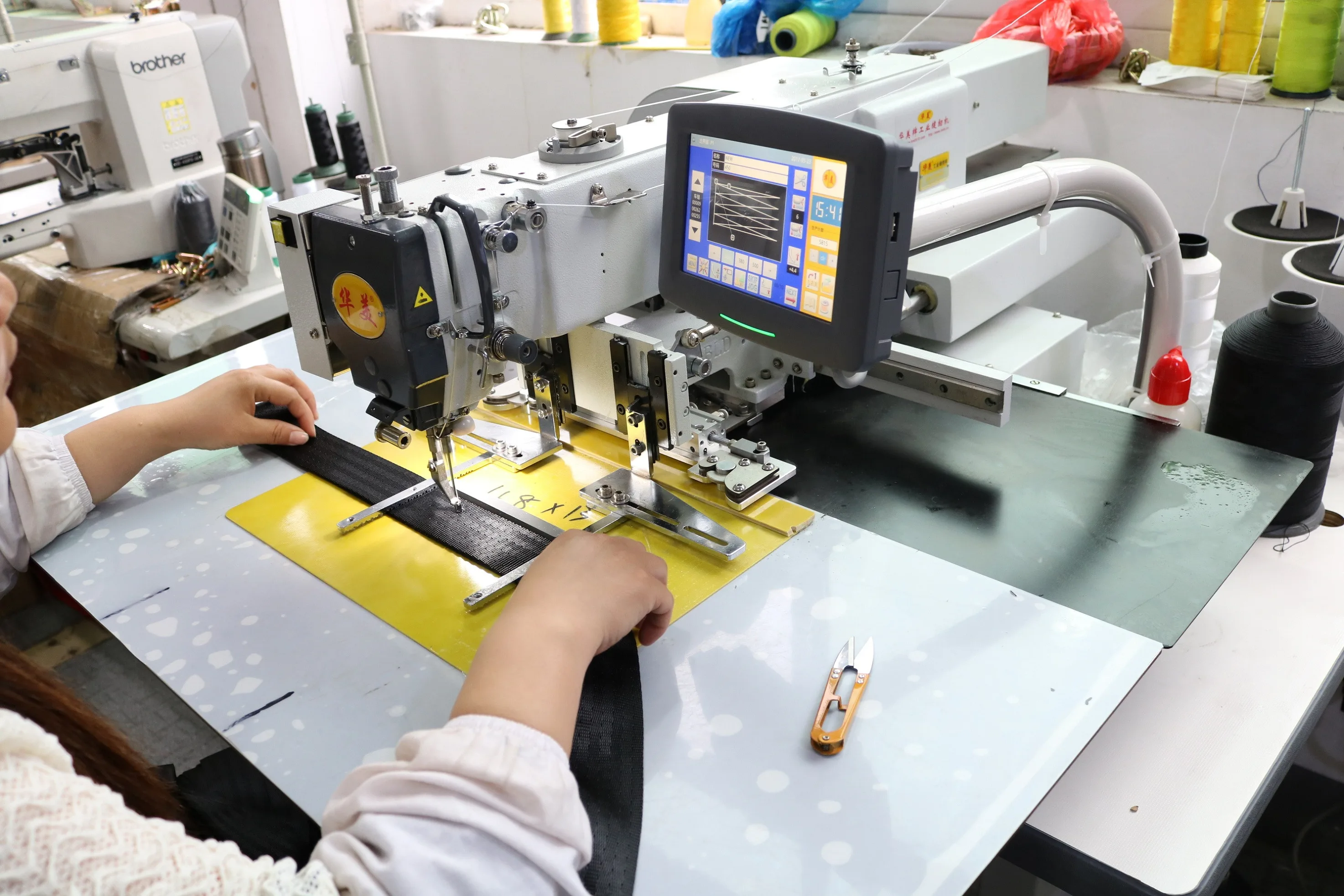 Production specialist reviewing a Pioneers Gears part